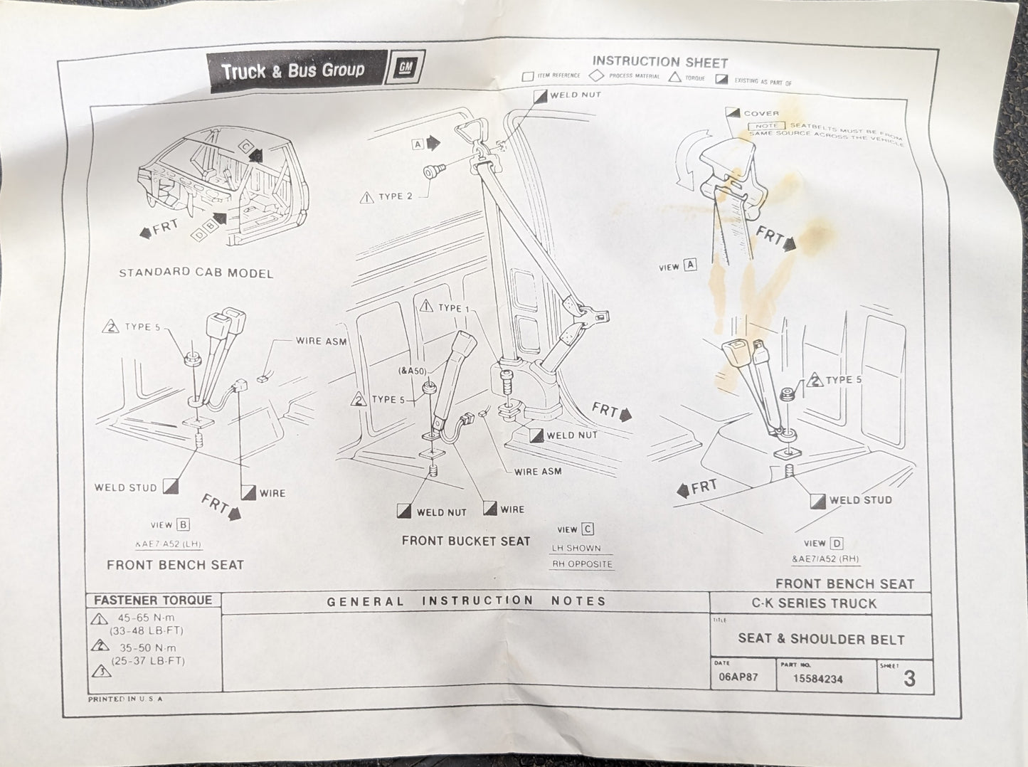 Instruction sheet for installing NOS Red Driver Bucket Seat Belt Retractor & Buckle (General Motors) in 1988-1994 Chevy/GMC C/K Trucks, with diagrams and labeled parts for standard cab bucket seat setups.
