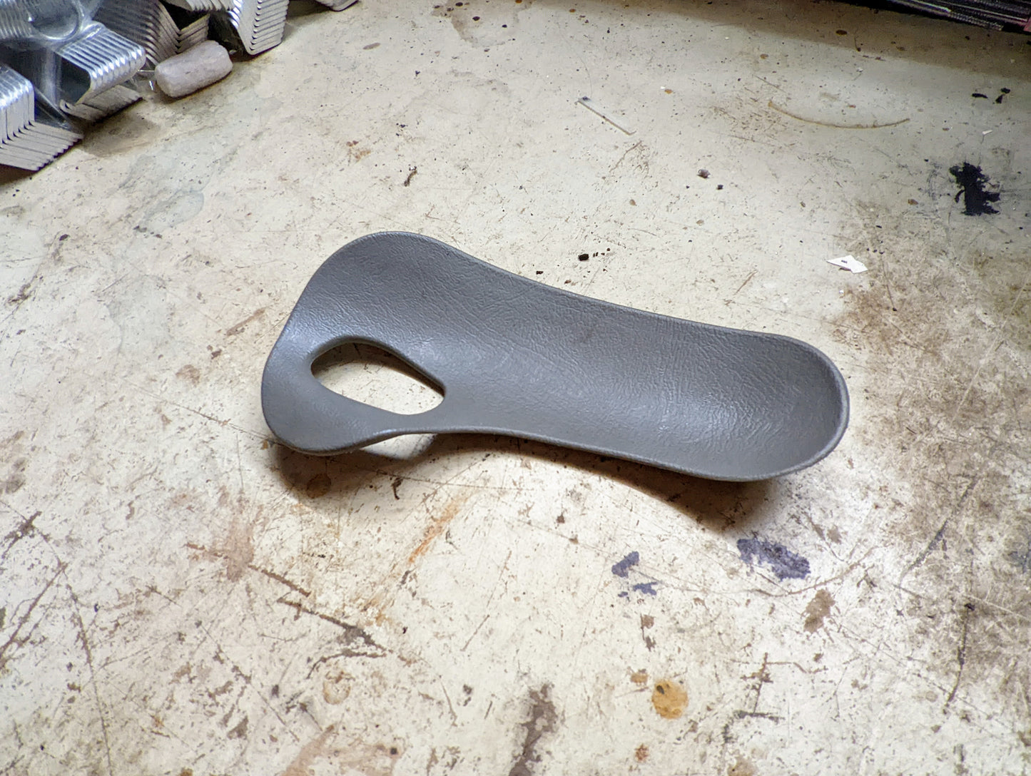 OEM Rear Driver Door Handle Trim Cup in Light Gray for 2003-2006 Chevy Silverado, Tahoe, Suburban, and more