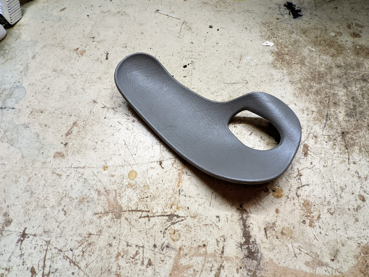 OEM Rear Driver Door Handle Trim Cup in Light Gray for 2003-2006 Chevy Silverado, Tahoe, Suburban, and more