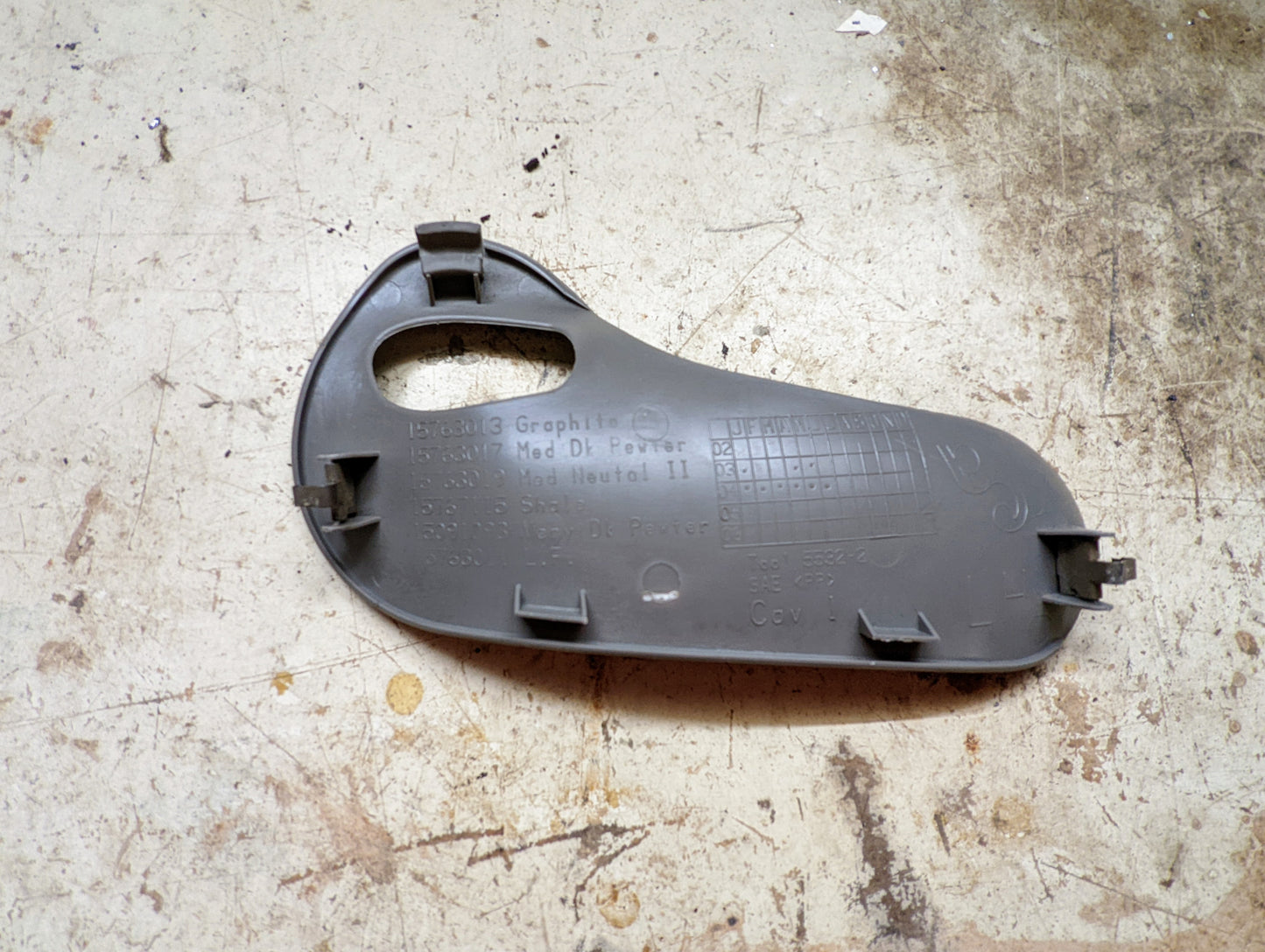 OEM Rear Driver Door Handle Trim Cup in Light Gray for 2003-2006 Chevy Silverado, Tahoe, Suburban, and more
