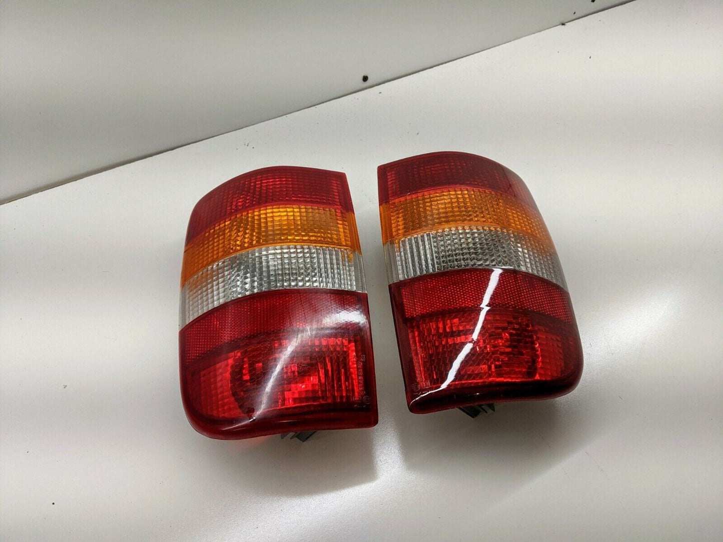 NOS Export Tail Lights w/Amber Turn Lens for 1995 - 2005 Chevy Blazer GMC Jimmy