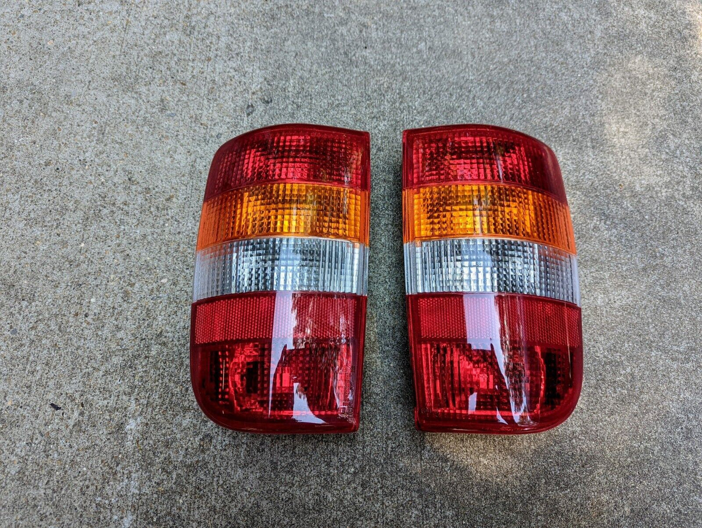 NOS Export Tail Lights w/Amber Turn Lens for 1995 - 2005 Chevy Blazer GMC Jimmy